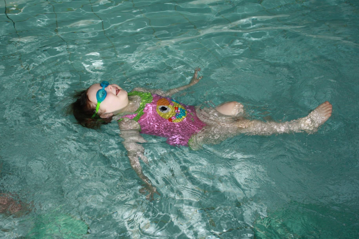 Child floating in water