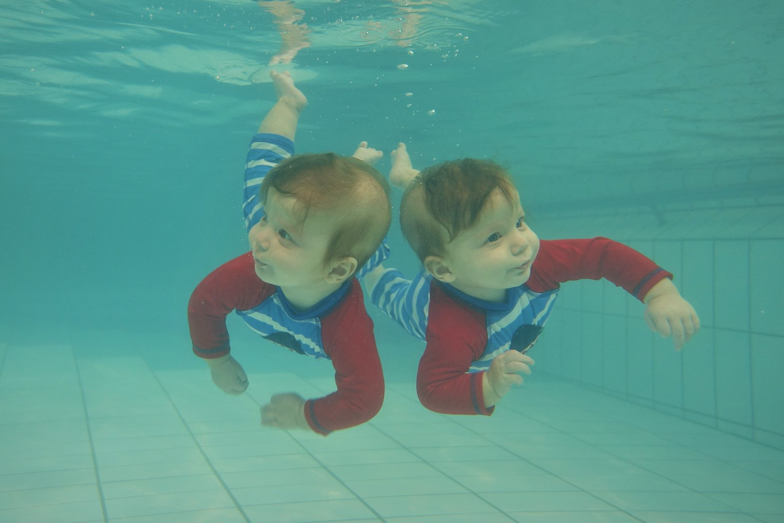 Twins swimming