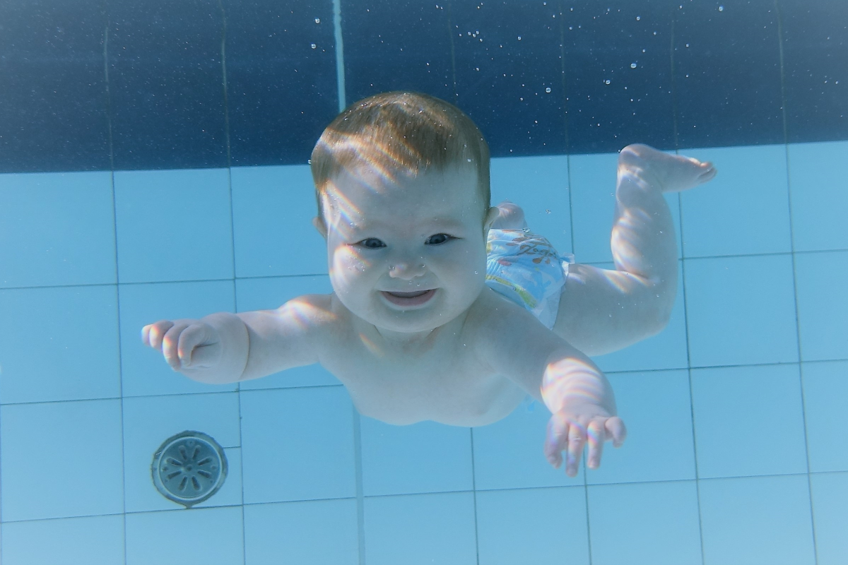 Baby swimming underwater